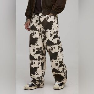 BoohooMAN Tall Washed Baggy Fit Cow Print Jeans